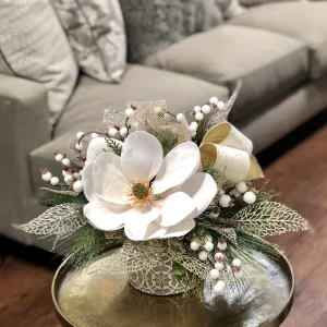 Magnolia with Evergreen and Berries in a Decorative Ceramic Vase