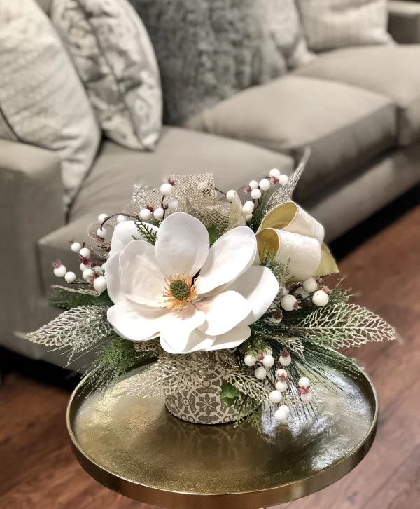 Magnolia with Evergreen and Berries in a Decorative Ceramic Vase