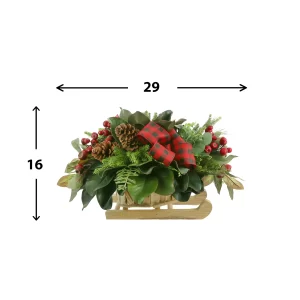 Magnolia, Cedar and Berry Holiday Arrangement in a Wooden Sled