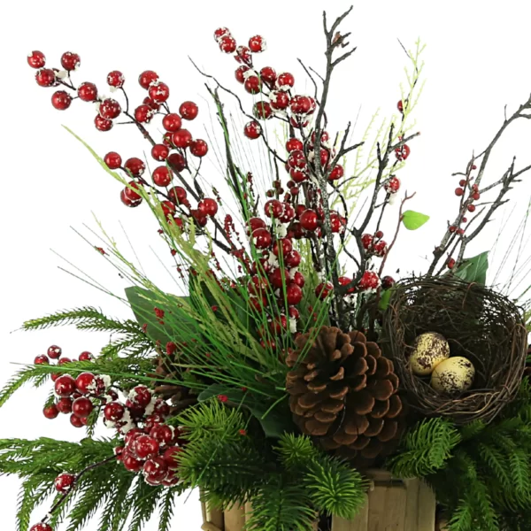 Evergreen Holiday Arrangement with Snowy Berries and Bird’s Nest in a Wooden Sleigh