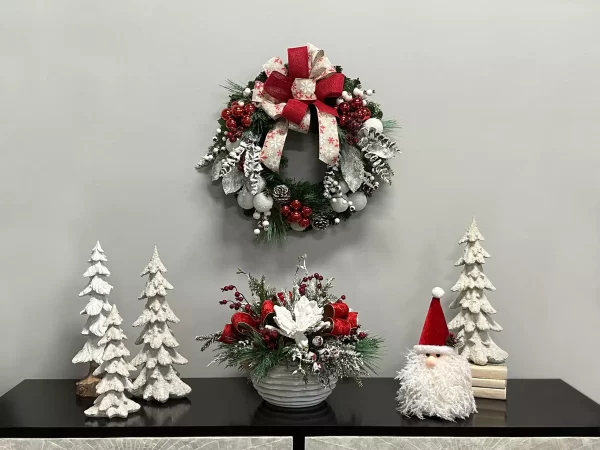 Holiday Arrangement with Magnolias, Snowy Greens and Berries in Ceramic Pot