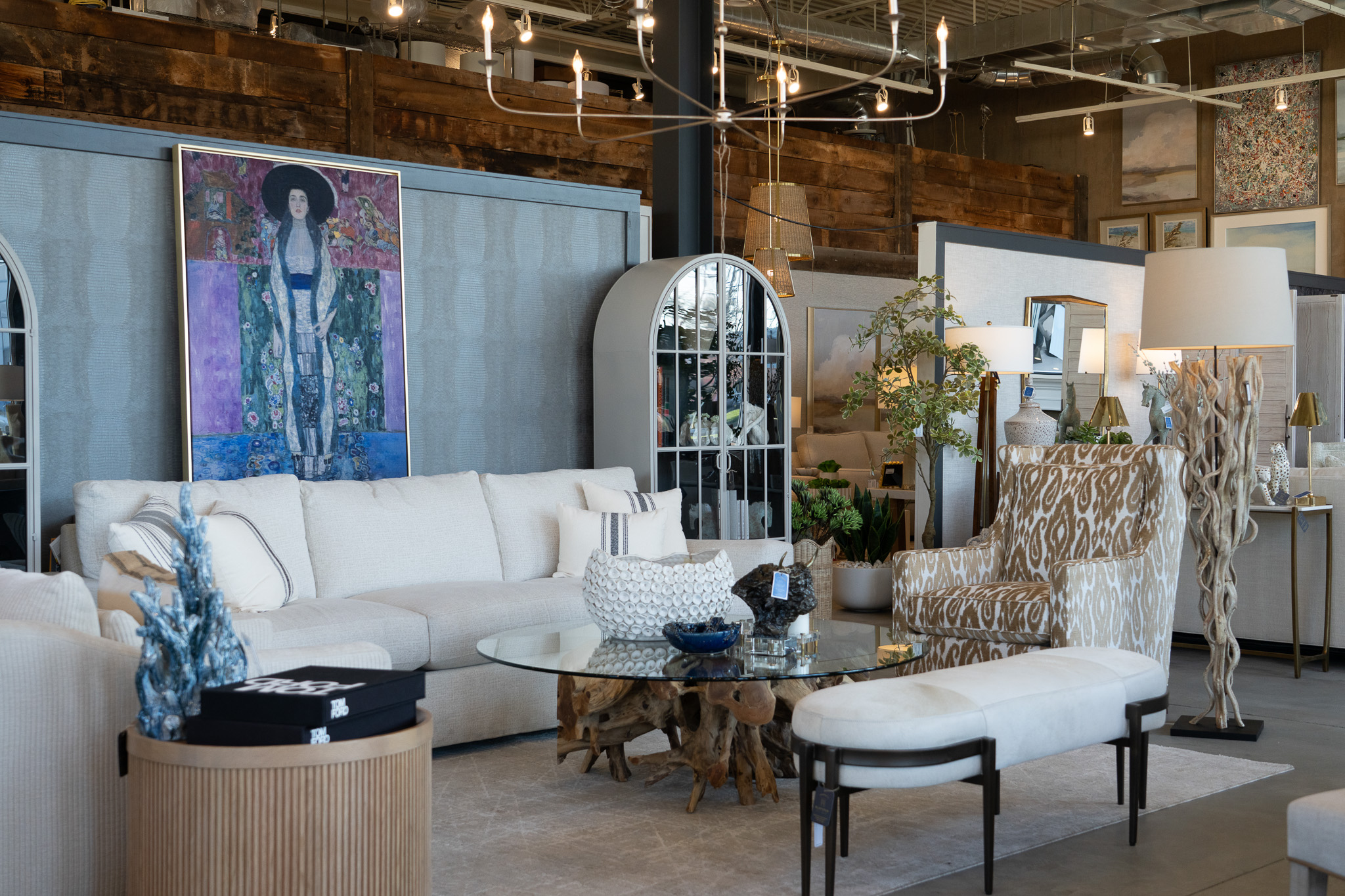 White sofa, modern decor, and other furniture options at Platypus Home