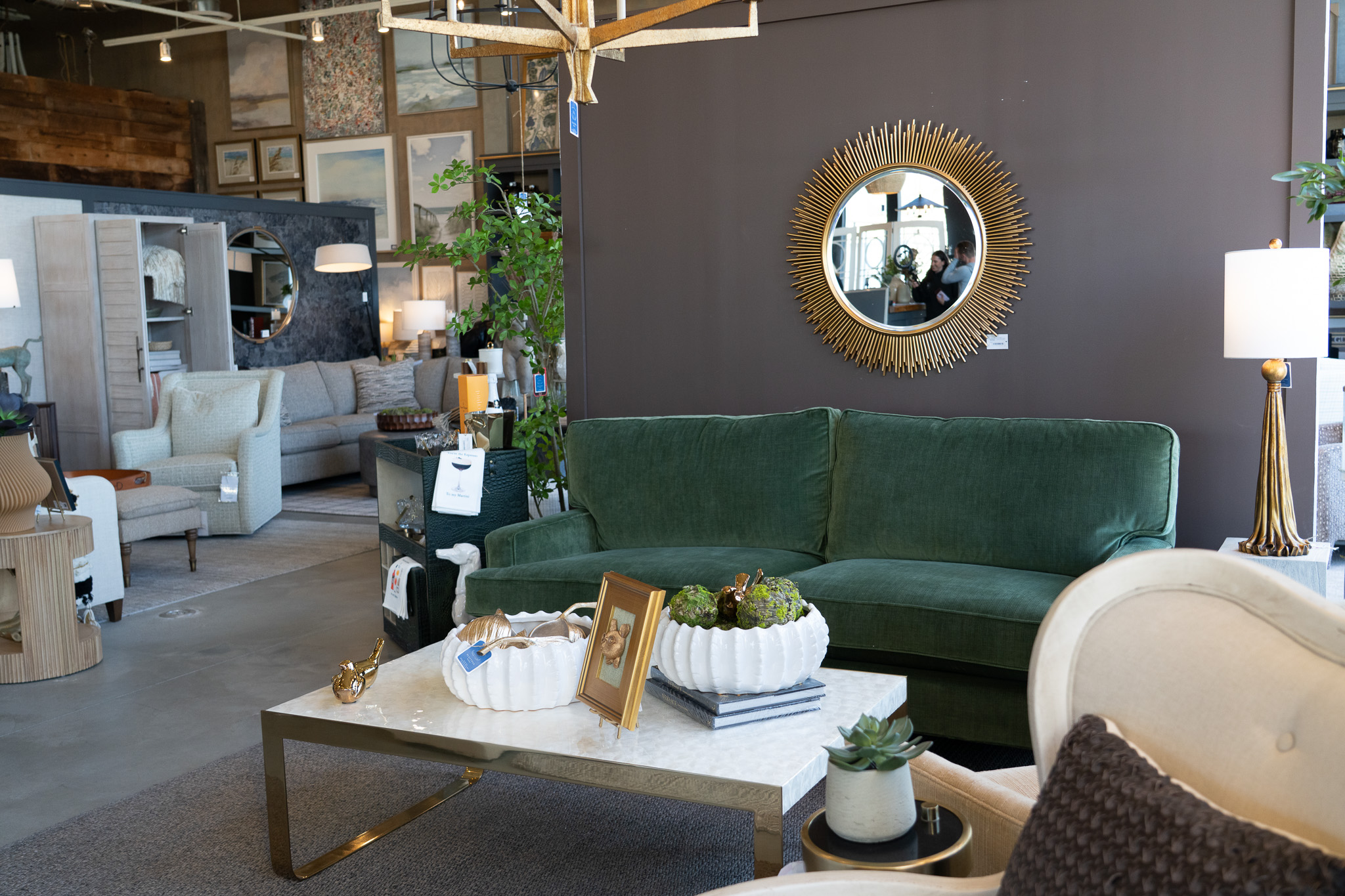 Sofas, armchairs, tables, decor, and mirrors inside Platypus Home's NJ showroom
